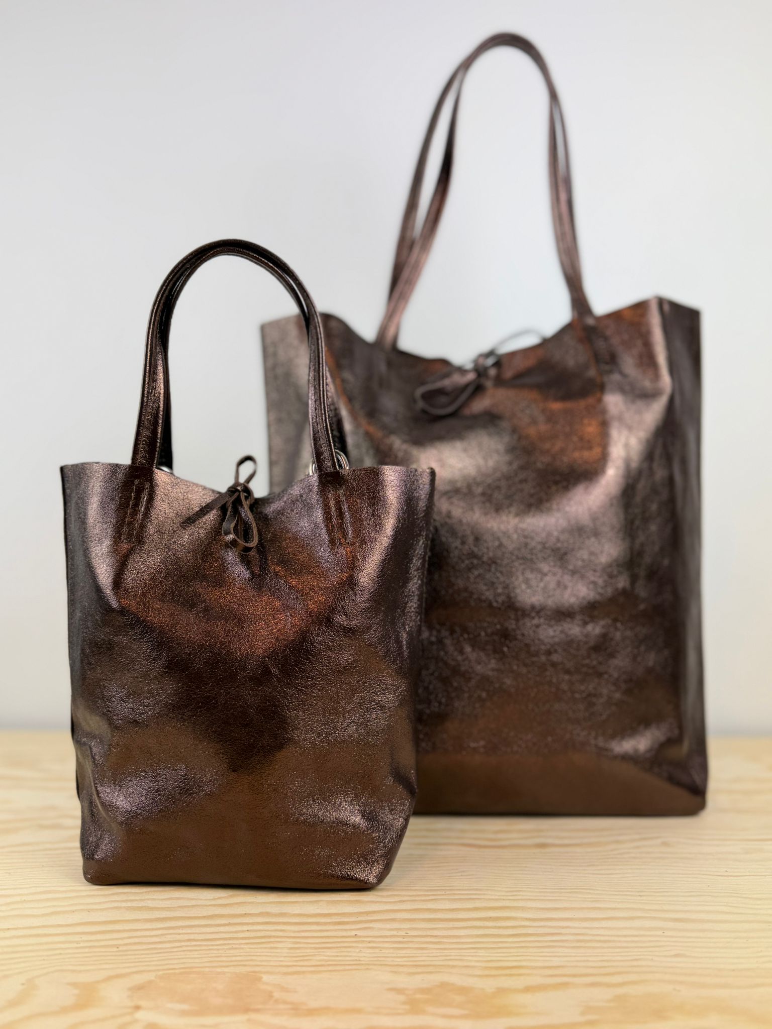 Mia schoudertas - Metallic Bruin 🤎