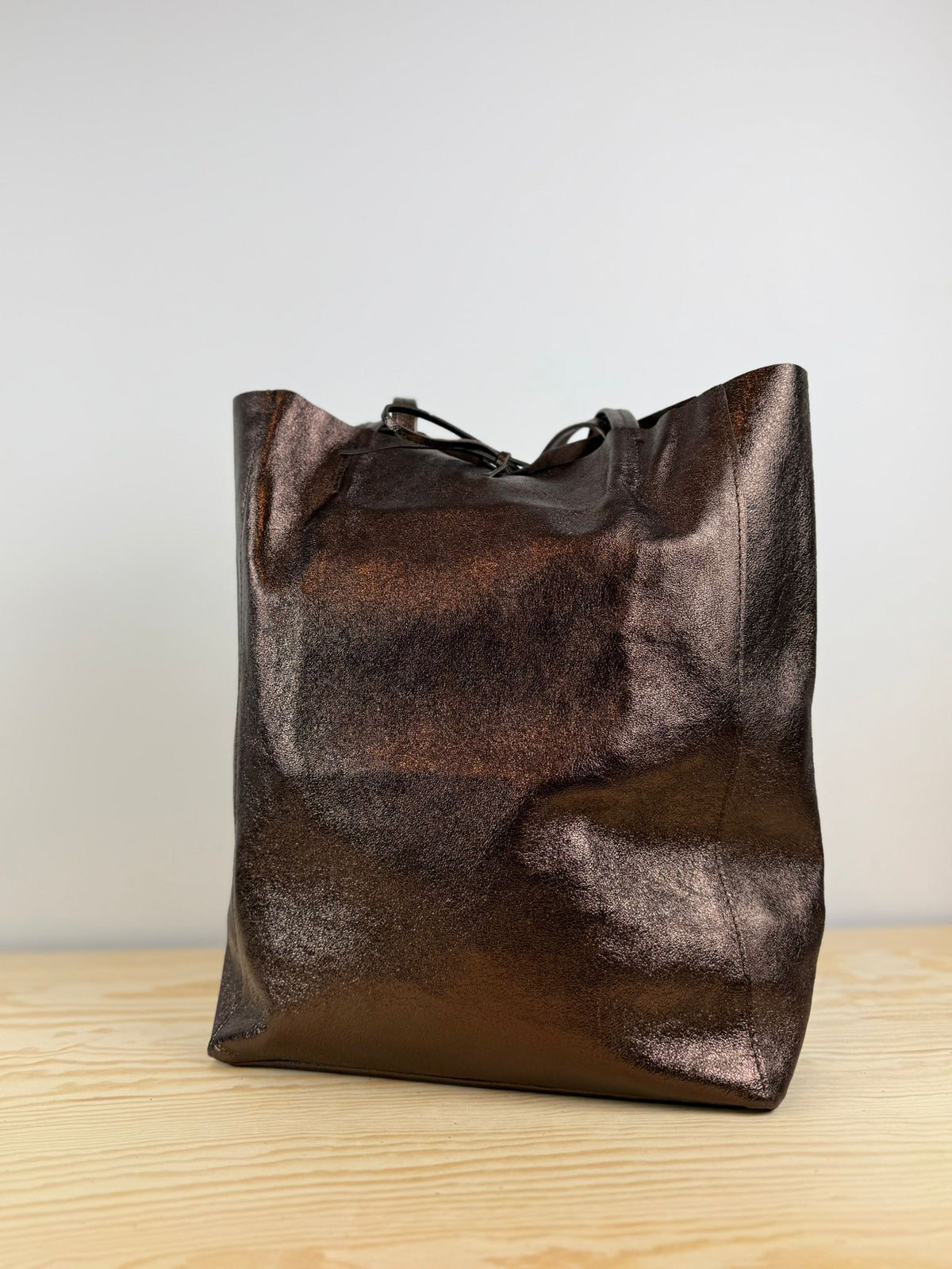 Mia schoudertas - Metallic Bruin 🤎